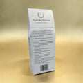 A 12 oz white ground mushroom coffee bag pictured from the back, branded Mariko Grove, with product description text and a upc